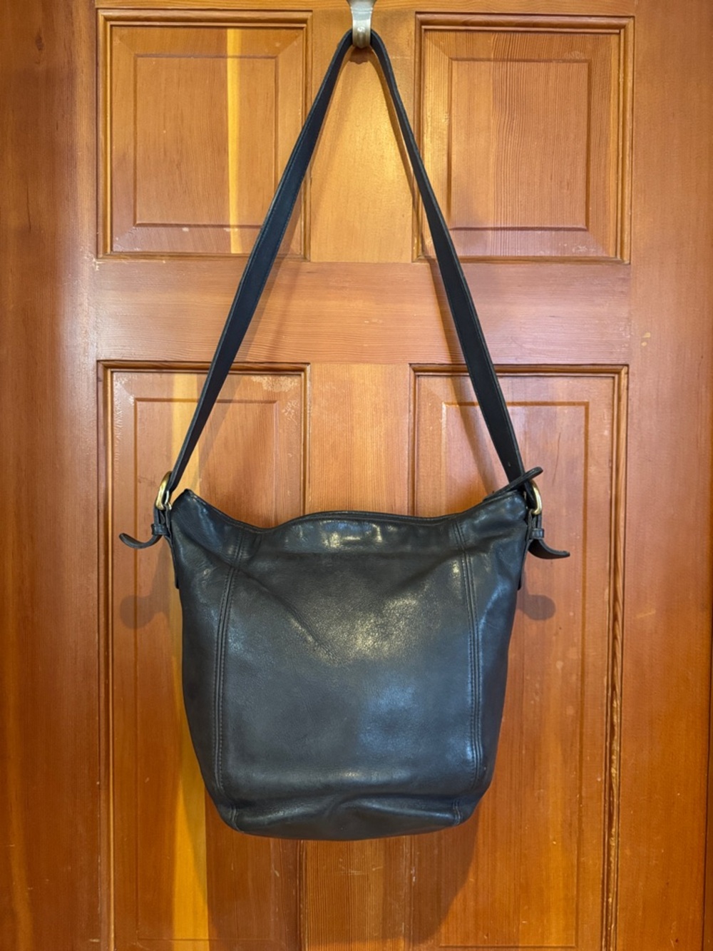 Coach vintage  80s Black Leather brass duffle Hobo Bag 0093. 102